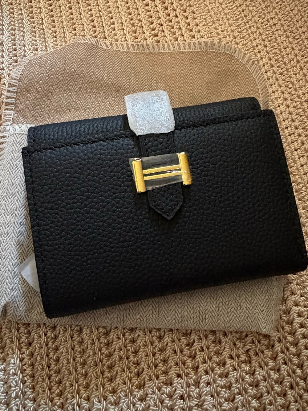 Black Pebbled Leather Wallet with Gold Accent